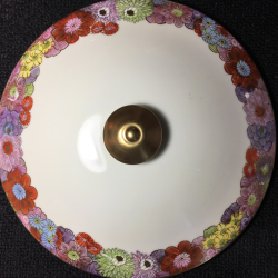 The missing areas are easily camouflaged by the floral motif making the repair an appropriate and more economical option.