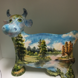 There are several areas on this cow that need to be filled and painted in order to bring her back to her former glory.