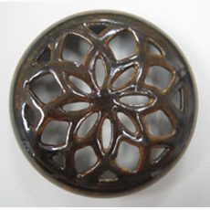 We reassembled, filled, created missing areas, painted and glazed this pottery lid that was broken in approximately 45 pieces. Sundog Restoration Studio Pottery Repair & Restoration Service