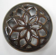 We reassembled, filled, created missing areas, painted and glazed this pottery lid that was broken in approximately 45 pieces. Sundog Restoration Studio Pottery Repair & Restoration Service